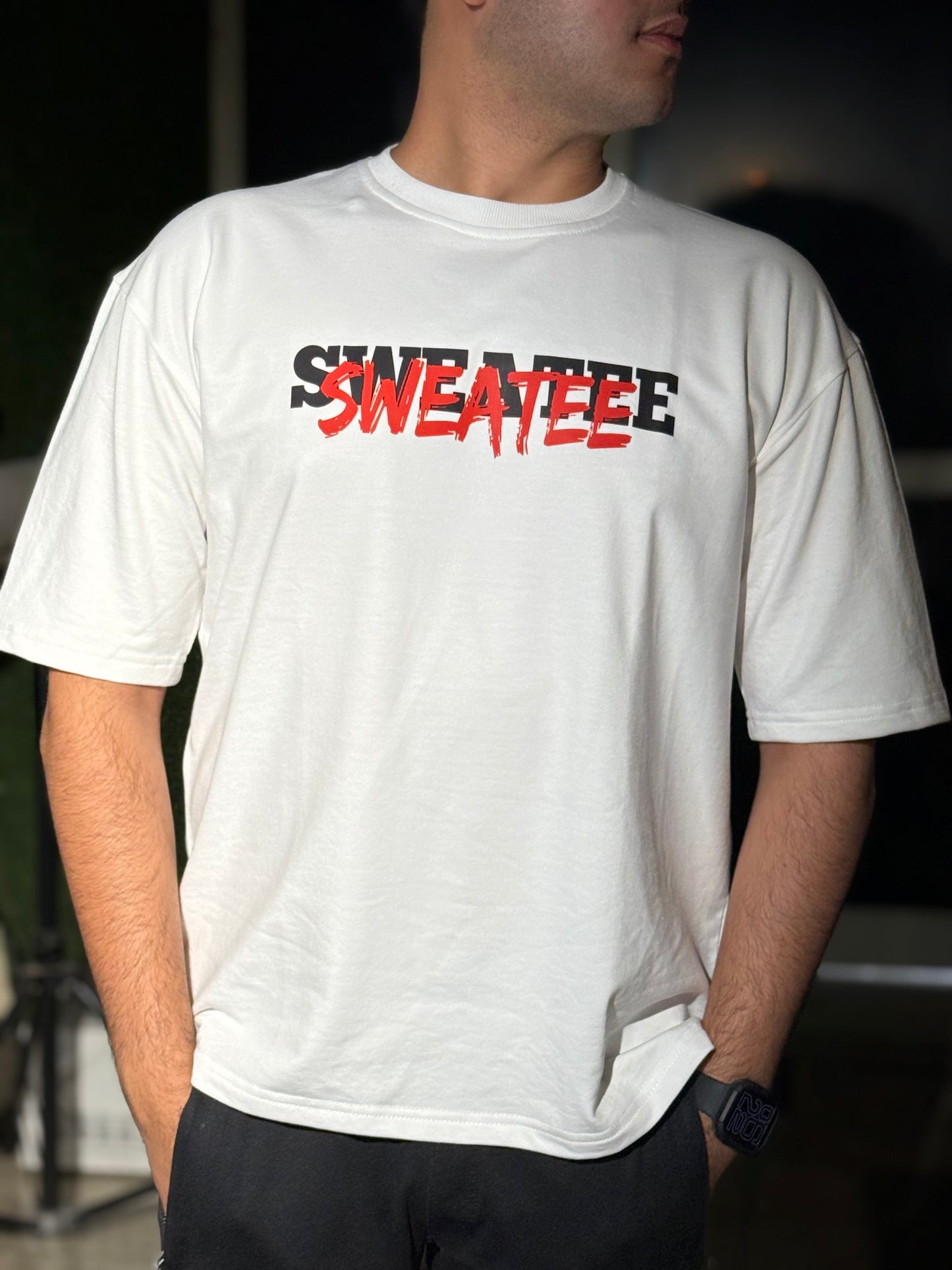 MONEY IS THE MOTIVE UNISEX OVERSIZED T-SHIRT